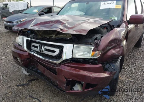 2010 Honda Ridgeline Rtl z USA, uszkodzony, nr VIN 5FPYK1F57AB005602